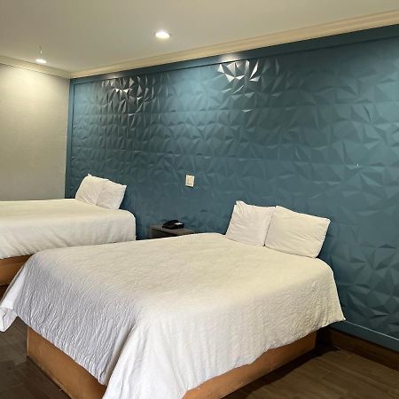 The Symphony Inn & Suites Хьюстон Экстерьер фото