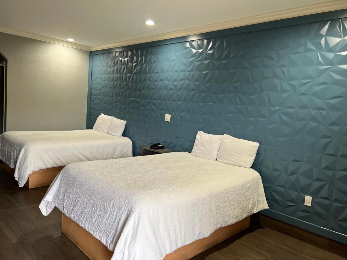 The Symphony Inn & Suites Хьюстон Экстерьер фото
