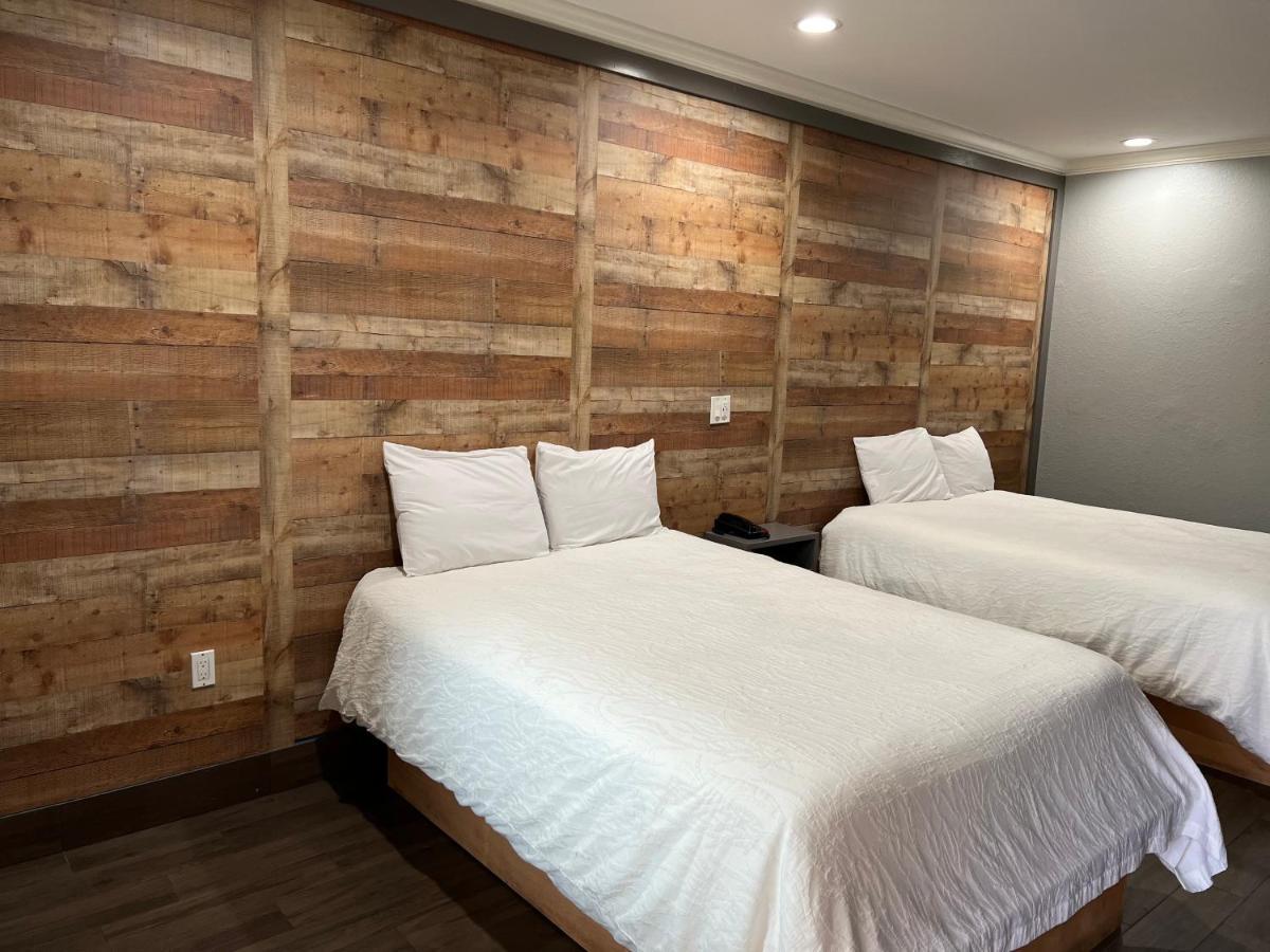 The Symphony Inn & Suites Хьюстон Экстерьер фото