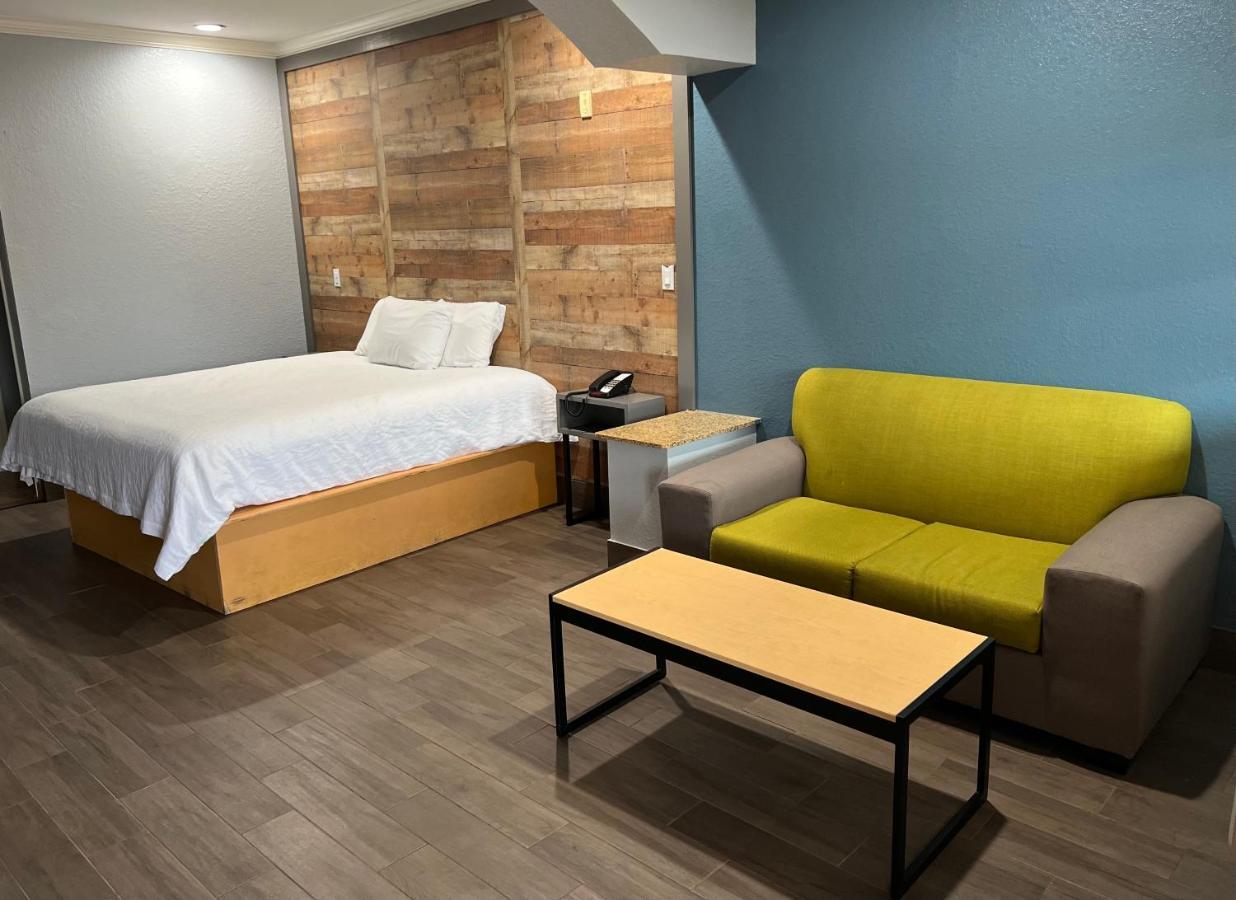The Symphony Inn & Suites Хьюстон Экстерьер фото